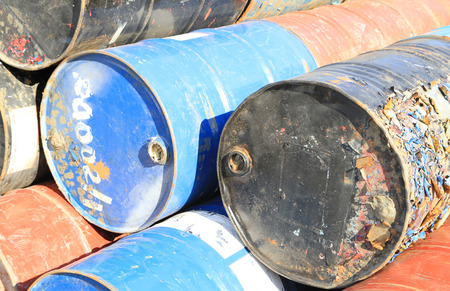 Pile of rusty fuel and chemical drumsの写真素材
