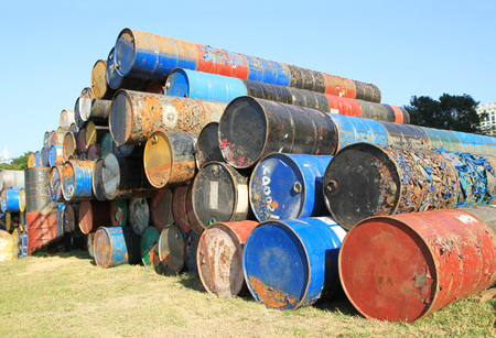 Pile of rusty fuel and chemical drumsの写真素材