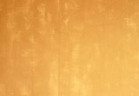 Yellow cement wall textured background.の写真素材