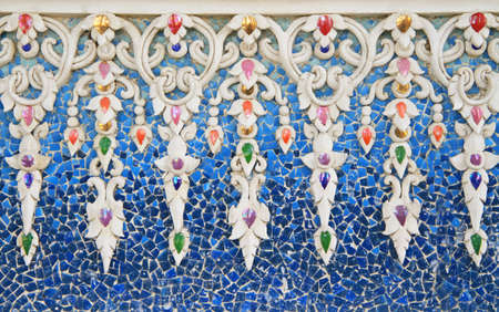 Traditional Thai style sculptures decorated on the wallの写真素材