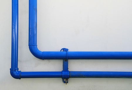 Blue pipes on the wall