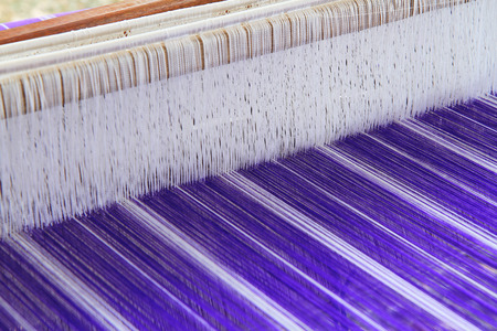 Blue Thai silk on the loomの写真素材