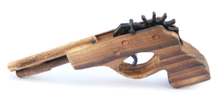 Wooden gun toy for child isolatedの写真素材