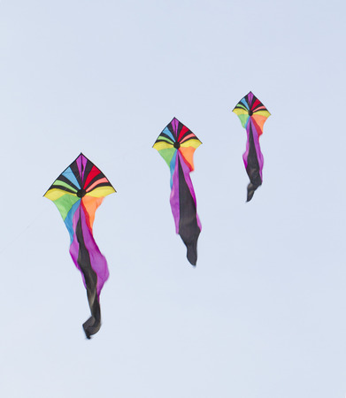 Colorful kite with blue sky backgroundの写真素材