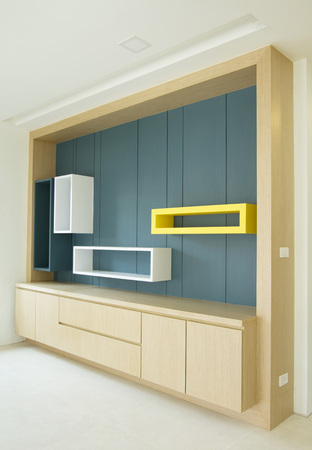 Wall shelves on blue wall backgroundの写真素材