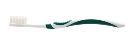 Green toothbrush isolated on white backgroundの写真素材
