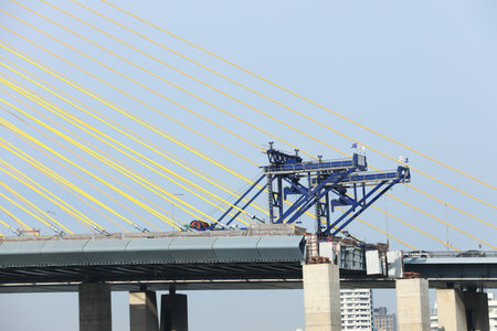 Heavy lifting  installed at Suspension bridge construction site.