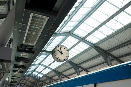 Public clock in sky train station with cctv.の写真素材