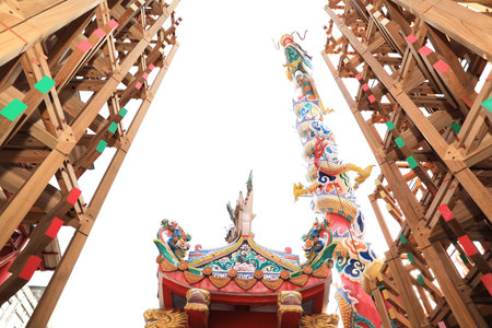 BANGKOK, THAILAND - FEBRUARY 12 : "The Wood Street Pavilion" made from lumber with golden dragon in background at Jao Mae Thubtim Shrine 
on February 12, 2023 in Bangkok, Thailand.のeditorial素材