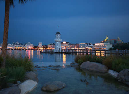 Evening  illuminated quay at lake in region of Orlandoのeditorial素材