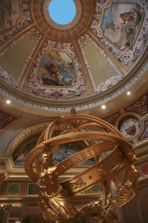 LAS VEGAS, NEVADA - MAY 5, 2009: Entry to Venetian hotel with golden Armillary Sphere in Las Vegas on May 5, 2009. With more than 4000 suites it`s one of the most famous hotels  in the worldのeditorial素材