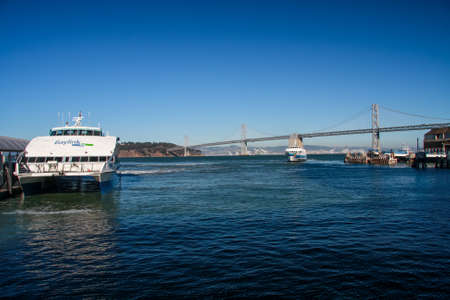 SAN FRANCISCO, CA, SEPT 20, 2010 - Baylink terminal and a high-speed catamaran ferry on Sept 29, 2010 in San Francisco. Ferries carry 2 million riders yearly.のeditorial素材