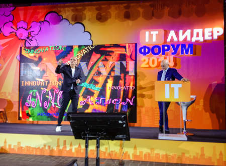 MOSCOW, RUSSIA - OCT 30, 2014: Kjell Nordstrom and Jonas Ridderstrale make speech at IT Leader conference on Oct 30, 2014 in Moscow, Russia. They are authors of bestseller book Funky Business Foreverのeditorial素材