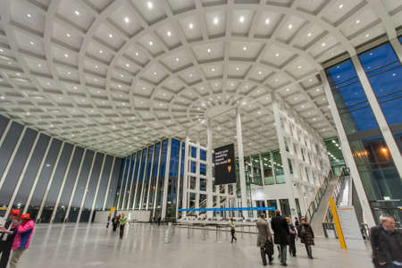 BERLIN, GERMANY  NOVEMBER 11, 2014: Attendees inside Messe Berlin Entrance South at SAP TechEd 2014 conference on November 11, 2014 in Berlin, Germanyのeditorial素材