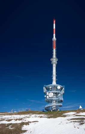 Telecommunication tower with a clear blue sky on the top of mount Rigi, Switzerlandのeditorial素材