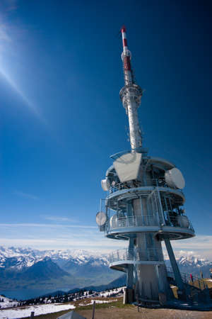 Telecommunication tower with a clear blue sky on the top of mount Rigi, Switzerlandのeditorial素材