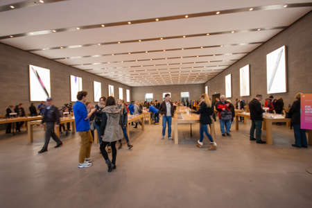 BERLIN, GERMANY - NOVEMBER 12, 2014: Buyers are shopping at Kurfuerstendamm Apple Store in Berlin, Germany on November 12, 2014.のeditorial素材