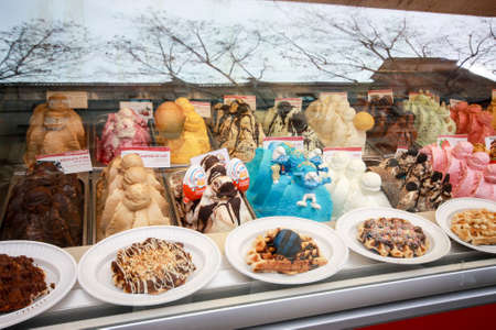 BARCELONA, SPAIN - FEB 9, 2014: Showcase of ice cream in window display at Rambla street in Barcelona Spain on Feb 9, 2014のeditorial素材