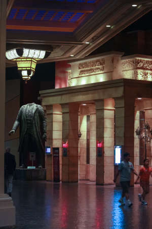 LAS VEGAS, NEVADA, USA - JUNE 11, 2013: Entrance to restaurant Red Square located inside Mandalay Bay hotel with sculpture of headless Vladimir Lenin in front in Las Vegas on June 11, 2013.のeditorial素材