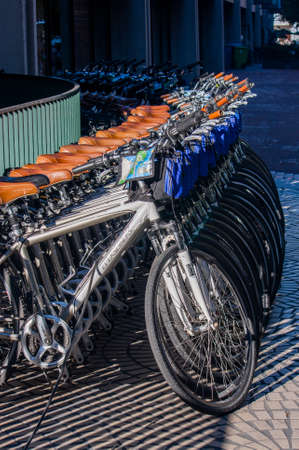 SAN FRANCISCO, CA, USA - SEPT 20, 2010: Row of parked bicycles at the Market street ready for rent on Sept 20, 2010 in San Francisco, USAのeditorial素材