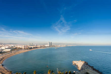 BARCELONA, SPAIN - NOVEMBER 10, 2015: Panoramic view of city seascape with San Sebastian, San Miguel and Barceloneta beaches on November 10, 2015 in Barcelona, Spain.のeditorial素材