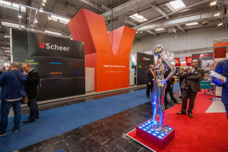 HANNOVER, GERMANY - MARCH 14, 2016: Booth of Scheer company at CeBIT information technology trade...