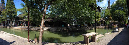 ZHUJIAJIAO, CHINA - AUGUST 30, 2016:Panoramic view of canal at ancient water town with a history of more than 1700 years in Zhujiajiao, China, on August 30, 2016.のeditorial素材