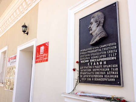 SIMFEROPOL, CRIMEA, UKRAINE - FEB 28, 2017: Memorial plaque in honor of Stalin on main office of...
