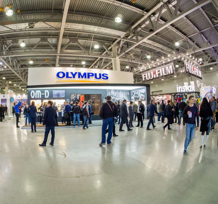 MOSCOW, RUSSIA - APRIL 21, 2017: Booth of Olympus company at PhotoForum 2017 trade show and exhibition in Moscow, Russia on April 21, 2017.のeditorial素材