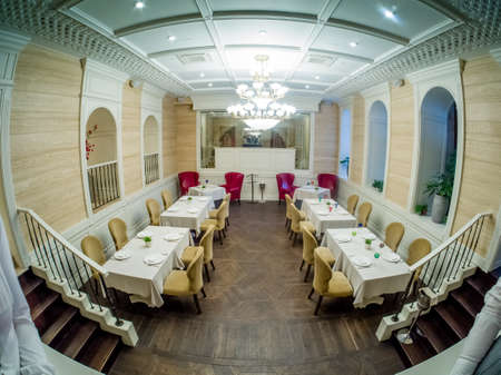 MOSCOW, RUSSIA - MAY 31, 2017: Interior of luxury restaurant Aragvi in Moscow, Russia on May 31, 2017. Restaurant was founded in 1930 by USSR NKVD minister Lavrentiy Beria. Now it has 9 halls.のeditorial素材