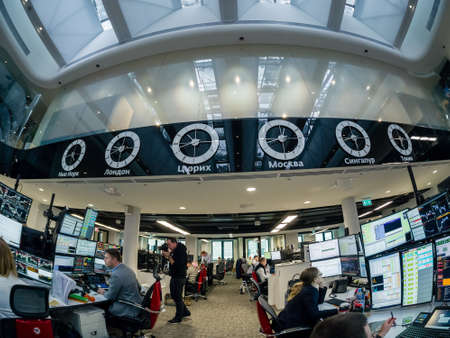 MOSCOW, RUSSIA - JAN 30, 2018: View to busy trading floor of the Sberbank CIB stock exchange in Moscow on Jan 30, 2018. It is the new largest trading floor in Europe with 4000 square meters area.のeditorial素材