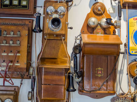 MOSCOW, RUSSIA - MARCH 20, 2018: Collection of old obsolete telephones exhibits in the museum of the telephone history on March 20, 2018 in Moscow, Russia.のeditorial素材