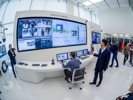 MOSCOW, RUSSIA - APRIL 3, 2018: Huawei Russia manager presents demo stand Smart Safe City at event...