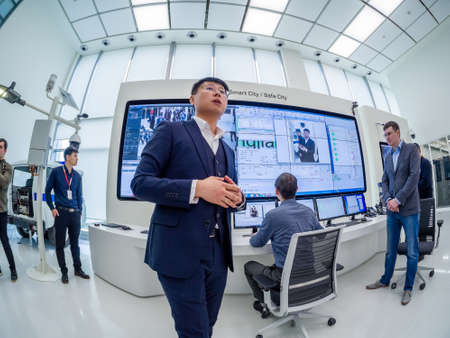 MOSCOW, RUSSIA - APRIL 3, 2018: Huawei Russia manager presents demo stand Smart Safe City at event...