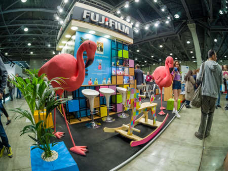 MOSCOW, RUSSIA - APRIL 13, 2018: Booth of Fujifilm company for promotion Instax cameras at...
