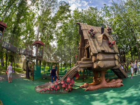 MOSCOW, RUSSIA - JULY 26, 2018: Unidentified people look at  fairytale hut on chicken legs in children's amusement park Lukomorye in Moscow, Russia on July 26, 2018.のeditorial素材