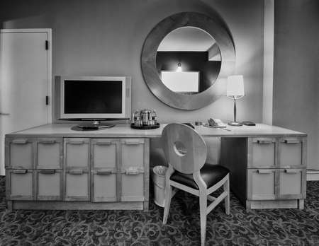 Study room with writing desk chair and lcd tv setの写真素材