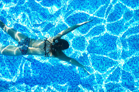 Woman in the poolの写真素材