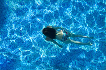 Woman in the poolの写真素材