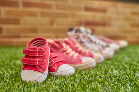 Pregnancy announcement with colored sneakersの写真素材