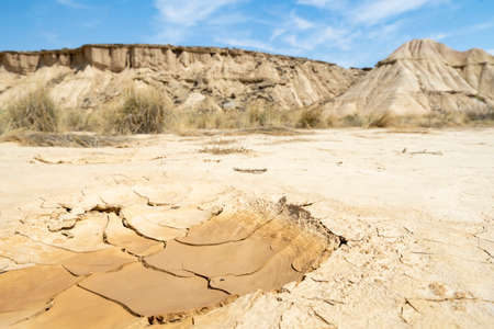 Dry cracked clay texture. Consequences of global warming. Ravages of climate change.の写真素材