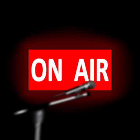 vector illustration of a microphone on air, realistic blurred background microphone on a tripod red glowing clear signs on airのイラスト素材