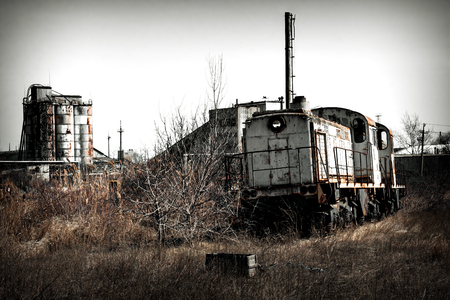 Train locomotive on the ruins of an unfinished nuclear power plant, Ukraine, Odessa region.