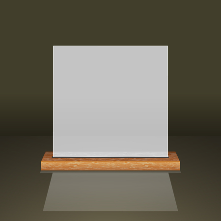 White translucent frame on a wooden shelfの写真素材