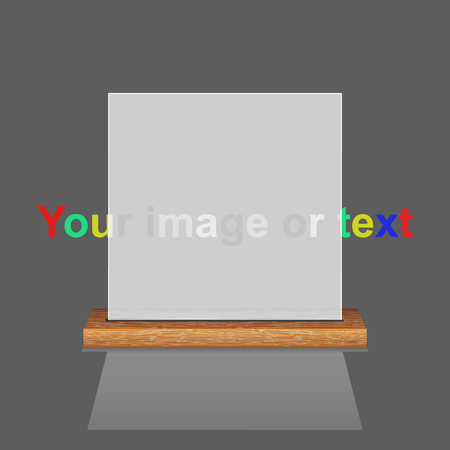 White translucent frame on a wooden shelf.の写真素材