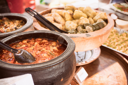 Close-up of oriental street food pots at open food marketの写真素材
