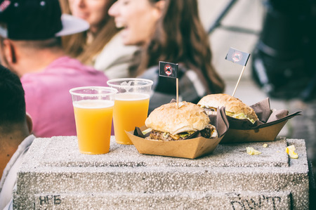 Beer and burger at open food market in Ljubljana, Slovenia