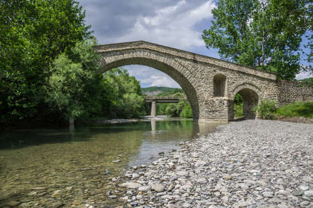 Stone bridge of Portitsa and Ziaka in Epirus mountains near Grevena in Greeceの写真素材