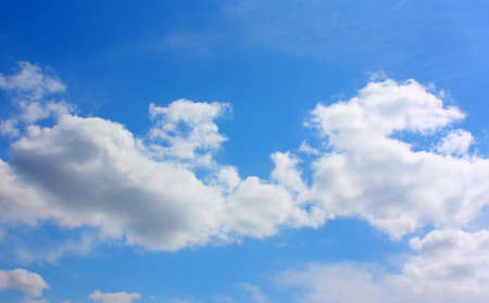 The blue sky and clouds in a summer dayの写真素材