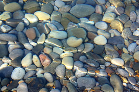 Stones under water. Background.の写真素材